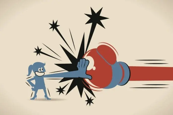 An illustration of a woman blocking a punch