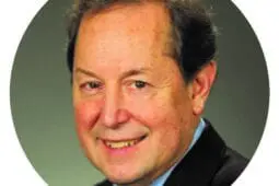 A headshot of a man
