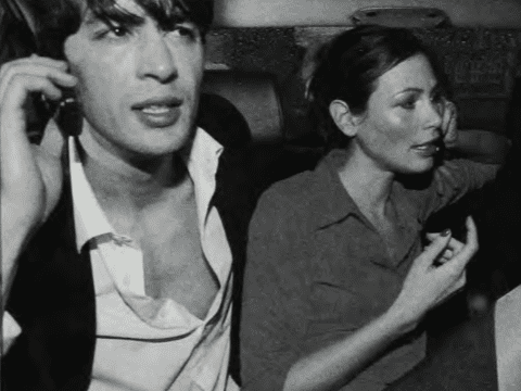 A couple on their cell phones | Photo @ UWE KREJCI / TONY STONE