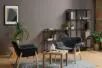 A psychologist office with two gray chairs facing each other