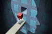 The outline of a head is projected on a wall with a small man lifting a block to fit it into the missing piece of the wall