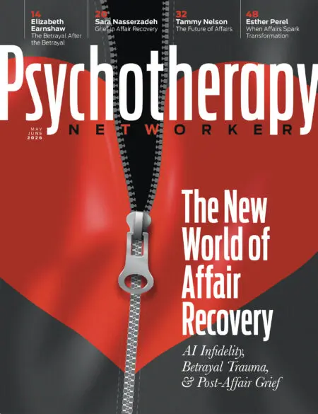 A large red heart on a soft grey background being unzipped down the middle