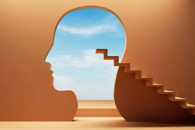 Illustration of a staircase climbing to the empty outline of a head