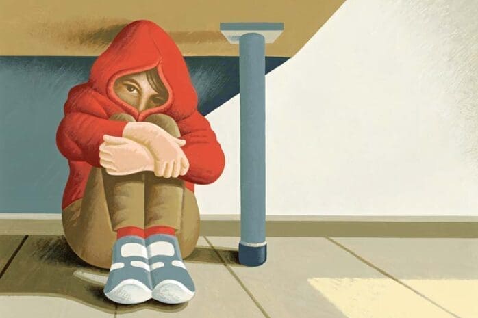 An illustration of a young boy hiding under a table