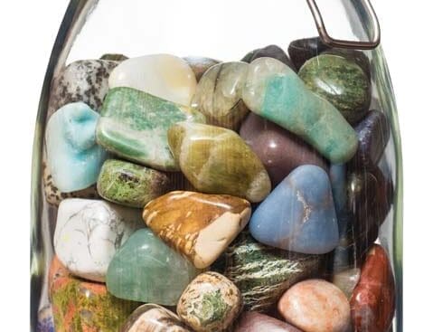 A jar full of polished rocks