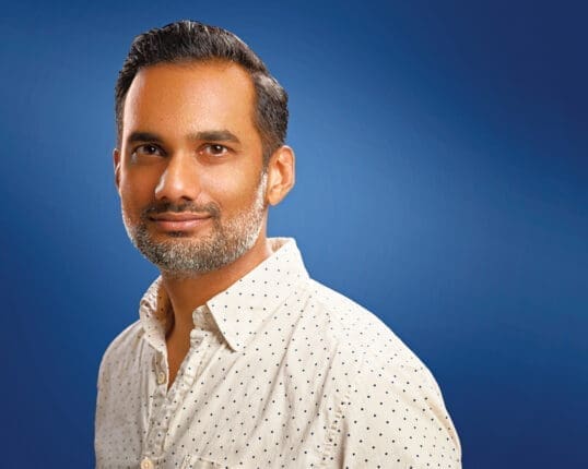 Headshot of a man looking at the camera