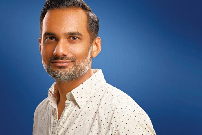 Headshot of a man looking at the camera