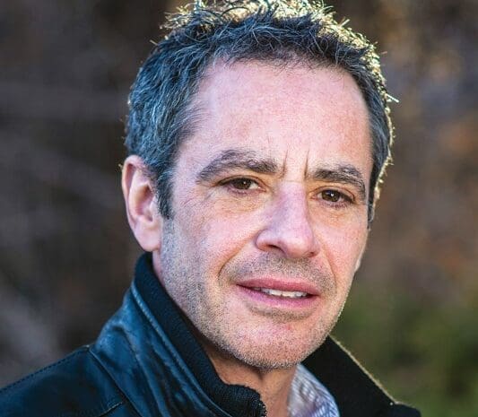 A headshot of a man