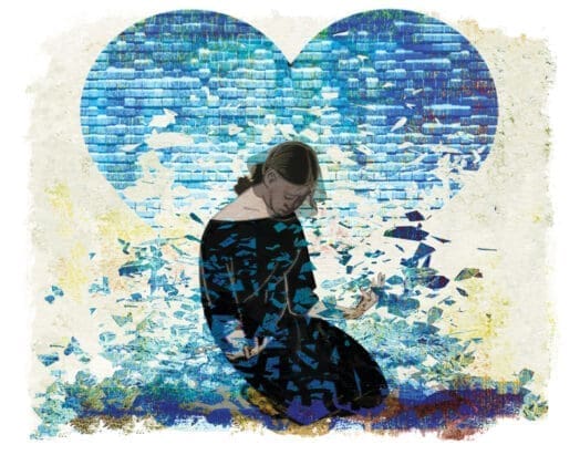 A woman kneeling with a heart in the background