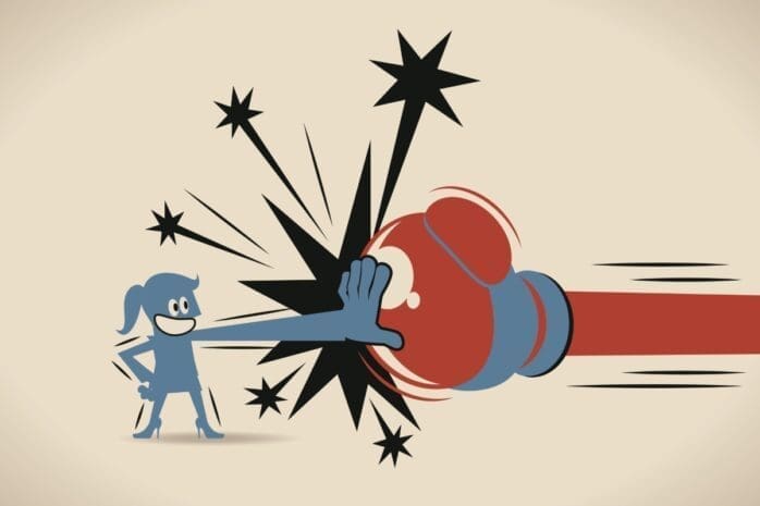 An illustration of a woman blocking a punch