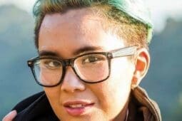 A young person with dyed hair