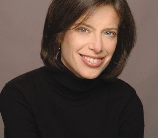 A headshot of a woman