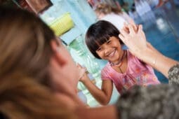 A woman and girl playing