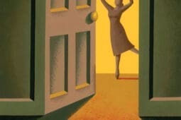 A woman dancing in an open doorway