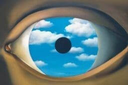 An illustration of an eye with a cloudy sky in the iris