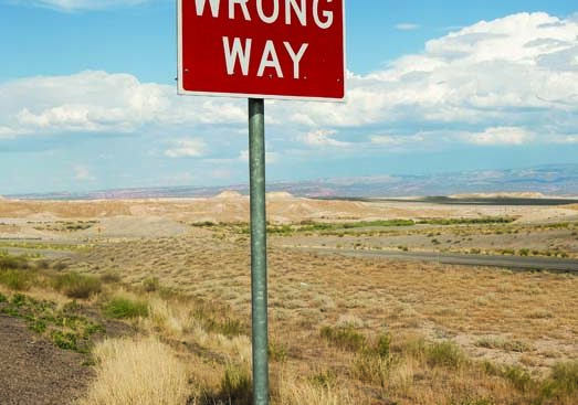 A sign that reads "wrong way"