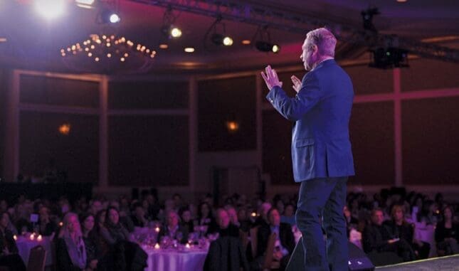 A man stands on stage