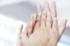 Hands holding each other