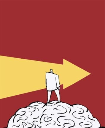 An illustration of a person standing on a brain looking at an arrow in the background