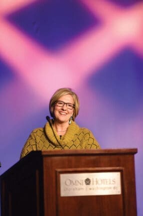 A woman at a podium