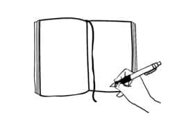 A hand writing with a pen