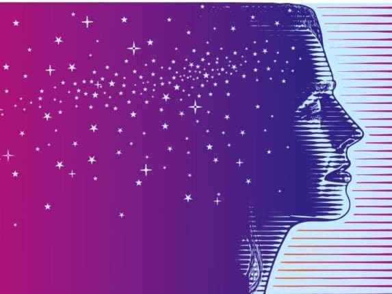 Illustration of a woman's profile with stars / Pexels/George Peters