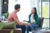Female therapist talking to a male client.