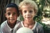 Two boys with a soccer ball | Photo @ Wetzkaz