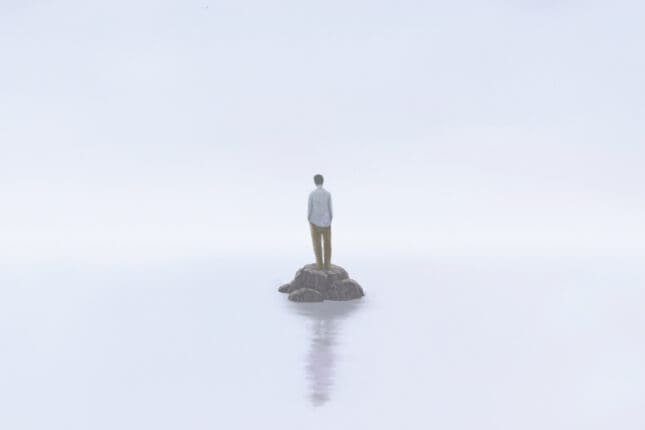 Man alone on an tiny island | ILLUSTRATION © JORM SANGSORN