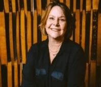 Woman in black shirt smiling