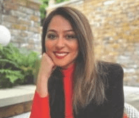 Woman in red shirt smiling