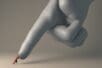 Illustration of an enormous hand pointing downward and nearly crushing two figure under its finger, as the two figures try to push it back